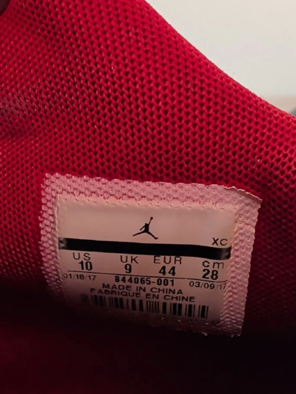 Jordan Men’s Black and Red High-Top Athletic Basketball Shoes.